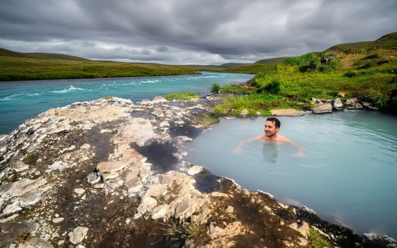 Planning a trip to Iceland? ✨ Our guide to Fosslaug covers everything from what to do at the hot spring ✅ to essential tips for your visit ⚡ Get answers to all your FAQs and discover a hidden natural wonder.
